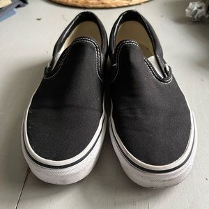 Vans black slip ons